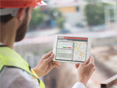 PelicanCorp word logo, sky blue text on white background. Image