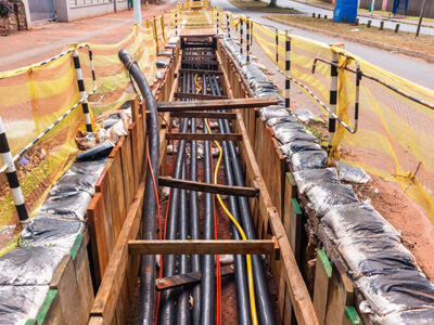 Underground utility pipes on a residential street.