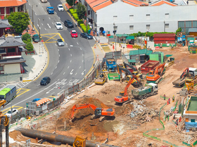 Construction site in Singapore with diggers